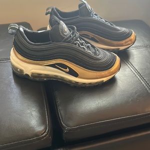 Black and gold air max 97